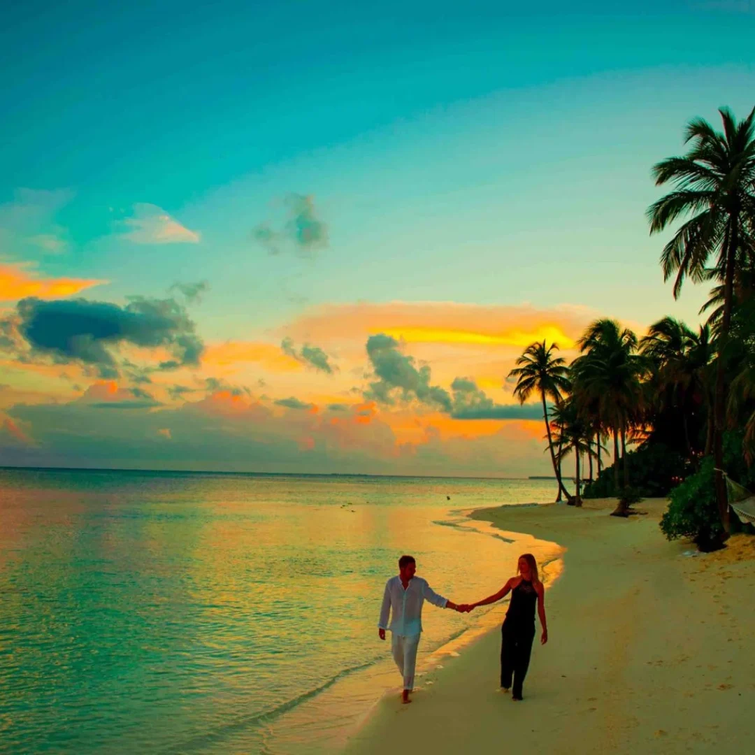 man-and-woman-holding-hand-walking-beside-body-of-water-1024992-compressed-1536x1022